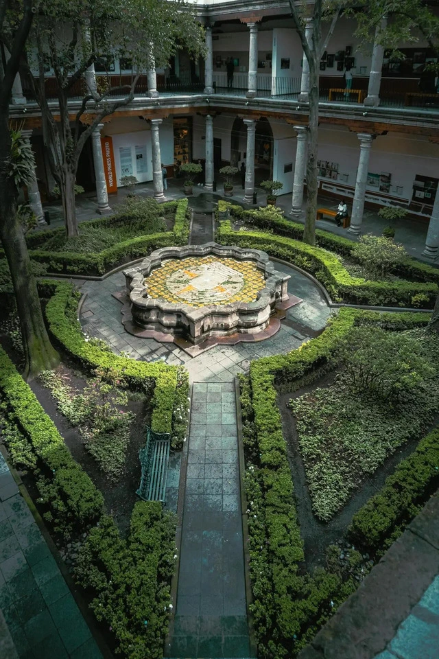 Impressive central garden in a colonial-style mansion
