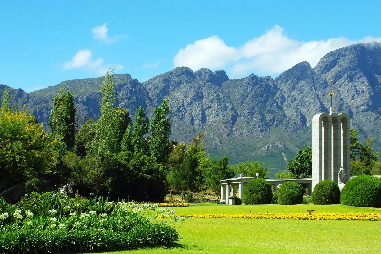 Gorgeous landscape design with mountains on the horizon